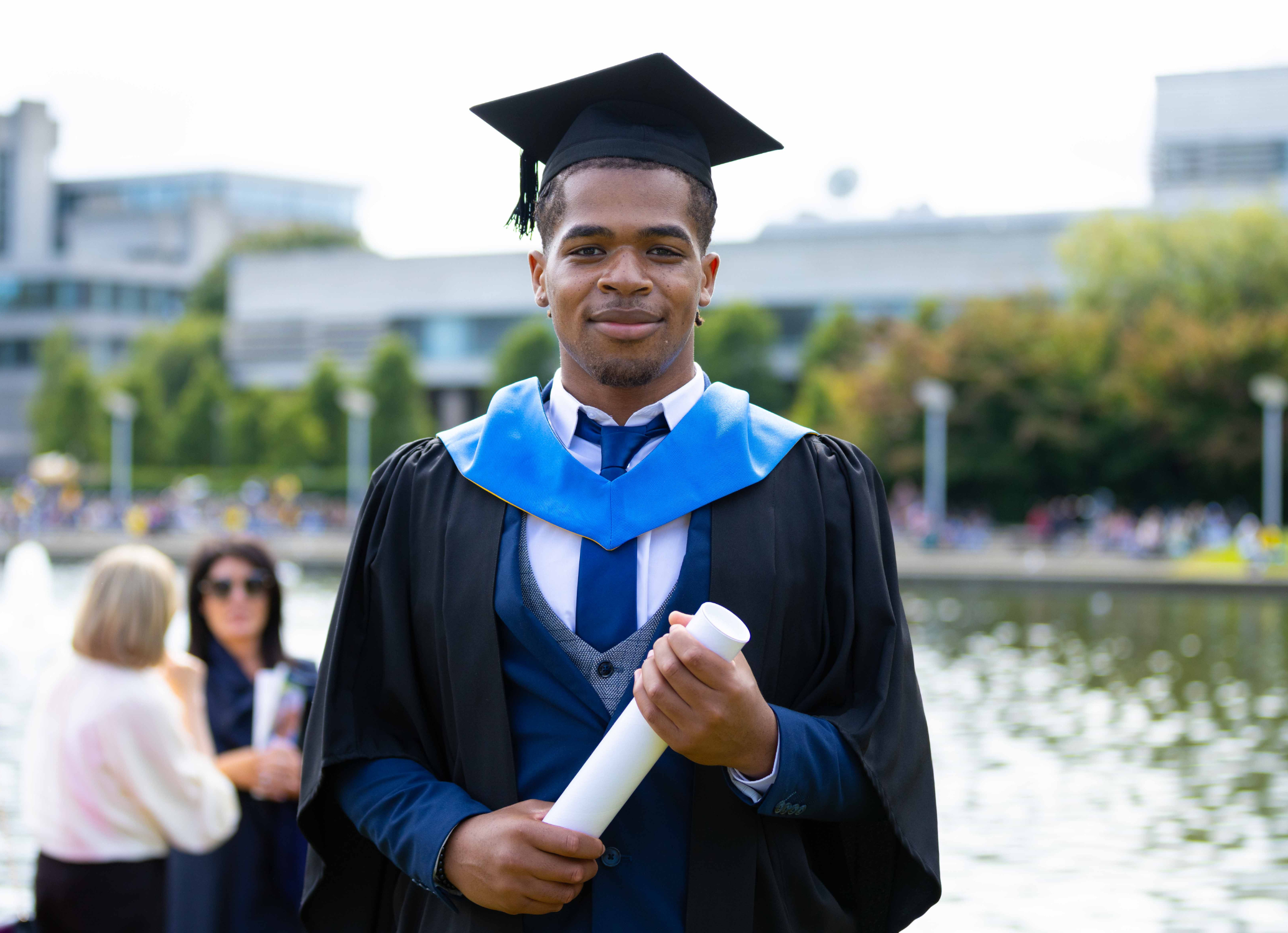 UCD alumnus Timmy Bakare at his graduation in 2025.